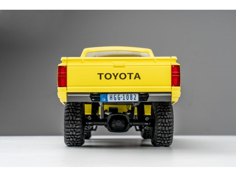 FMS Toyota Hilux Scaler Crawler 1/18 RTR - Geel